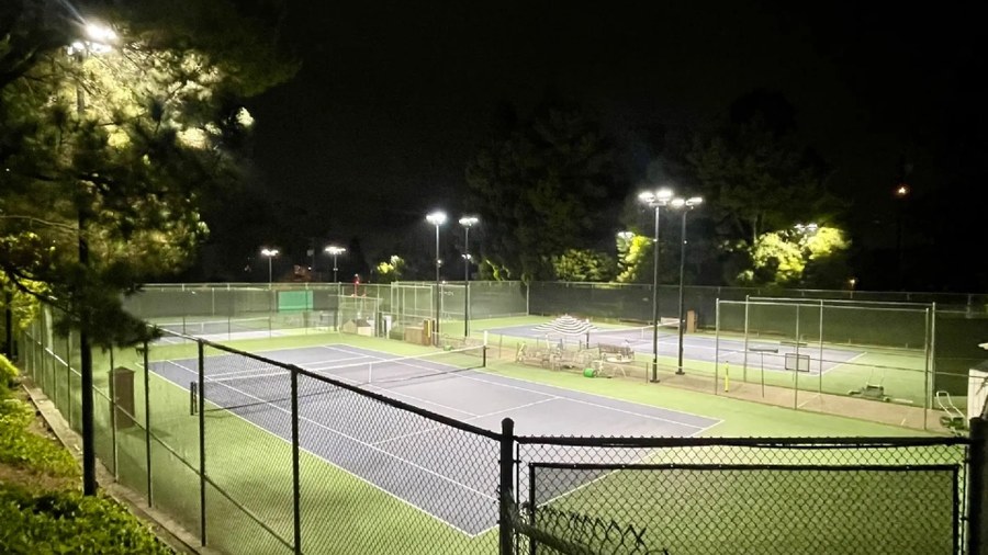 Dark-sky-minded court lighting for a hillside club: Claremont Club & Spa