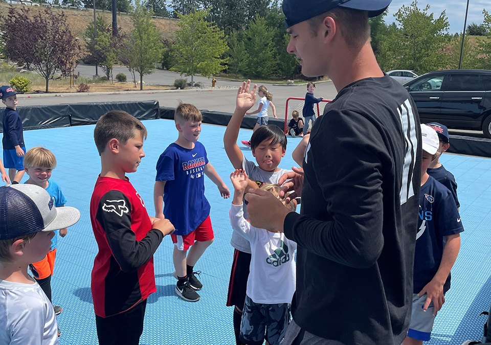 A portable ball hockey court that travels with the school: Gretzky Hockey School