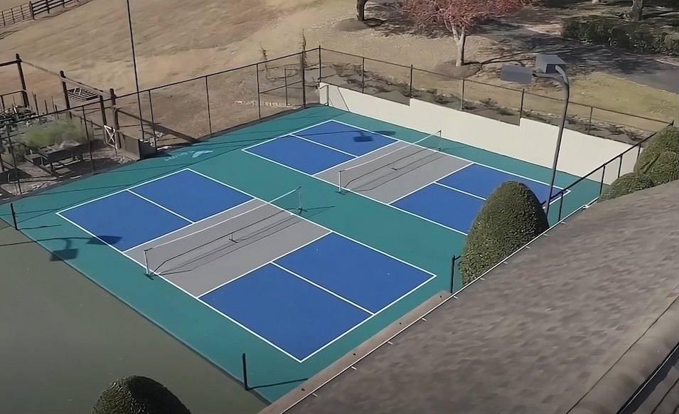 A tennis court turned into two pickleball courts: a Georgia family estate
